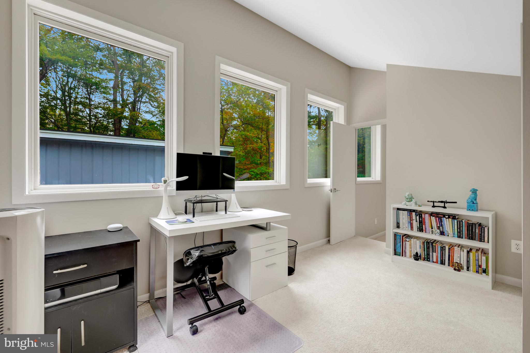 526 Springvale Road Great Falls, VA 22066 - Photo 25 of 55 a view of a workspace with furniture and a window