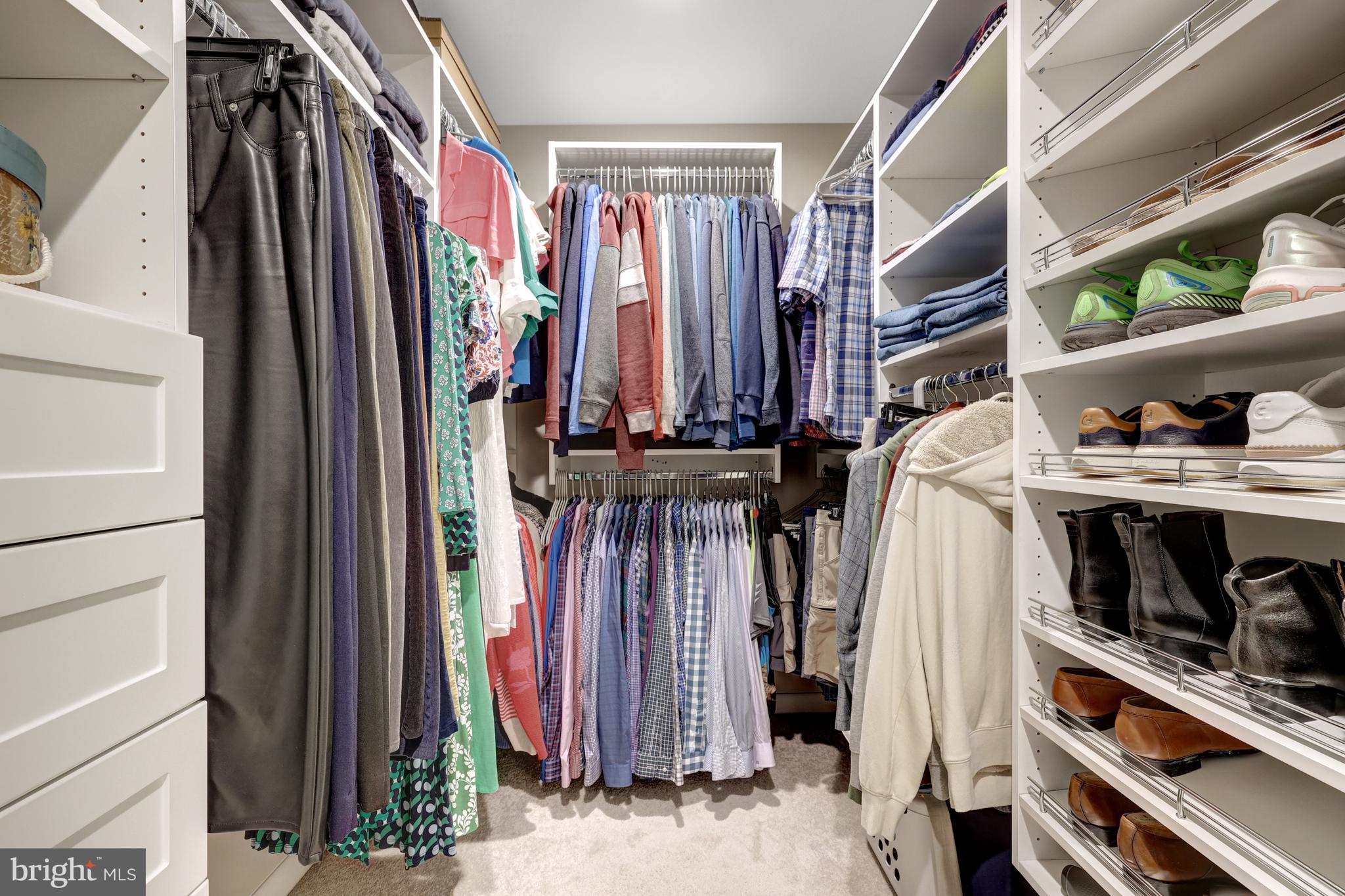 526 Springvale Road Great Falls, VA 22066 - Photo 30 of 55 a view of walk in closet with clothes and shoes