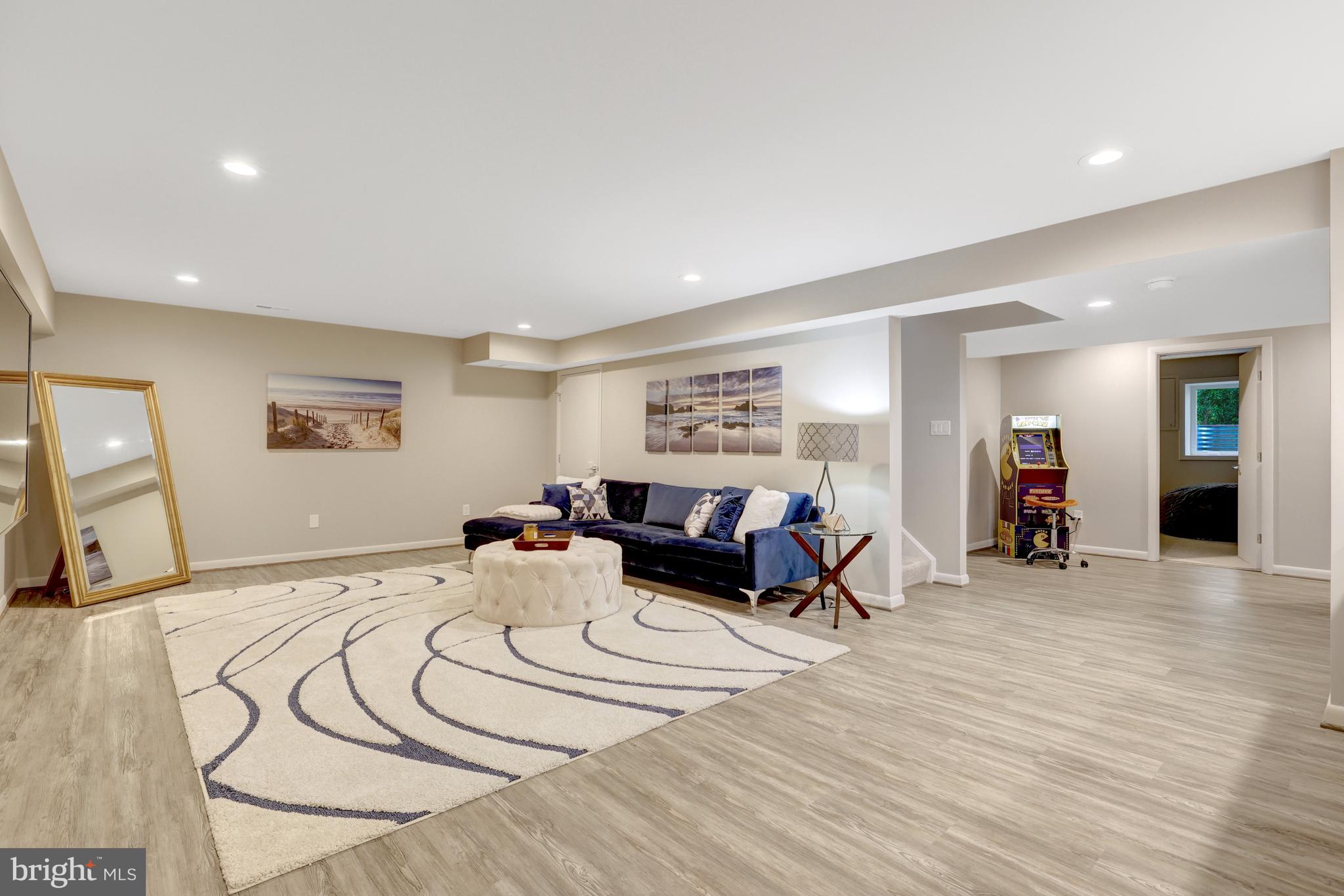 526 Springvale Road Great Falls, VA 22066 - Photo 35 of 55 a living room with furniture and a wooden floor