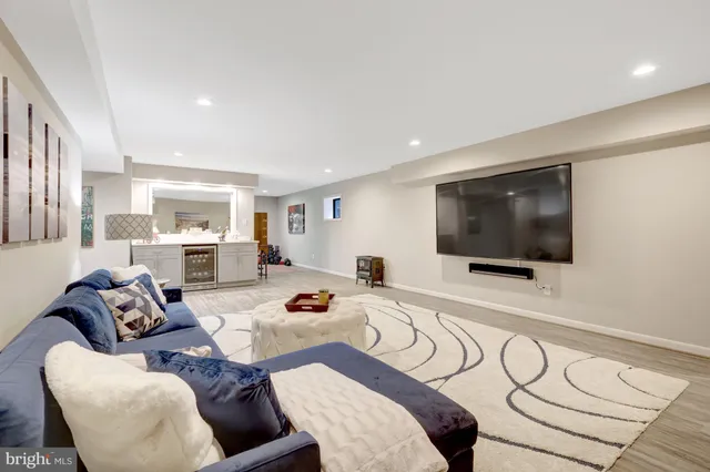 a room with gym equipment and a large window