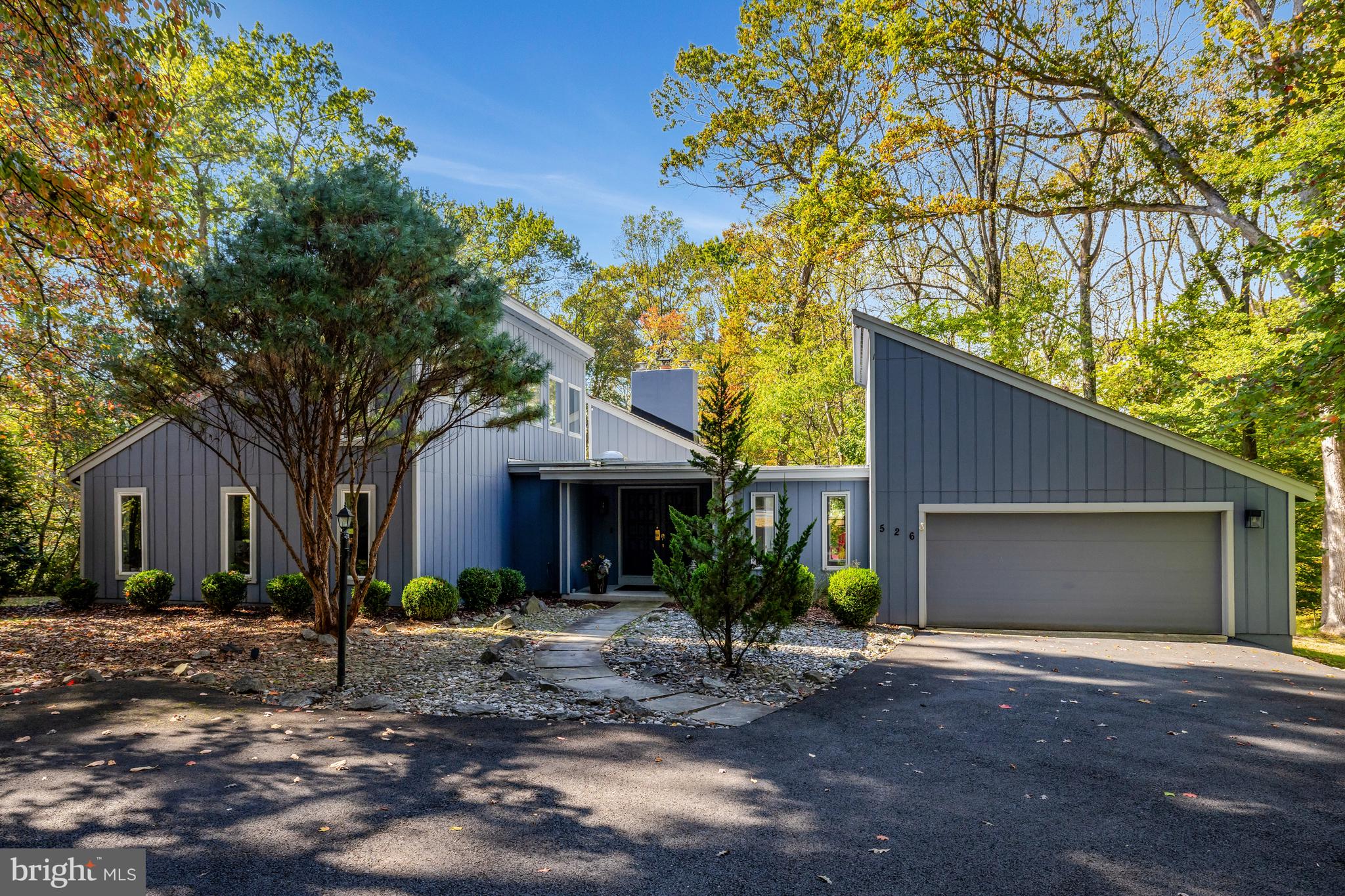 526 Springvale Road Great Falls, VA 22066 - Photo 44 of 55 a view of a house with a tree in front of it