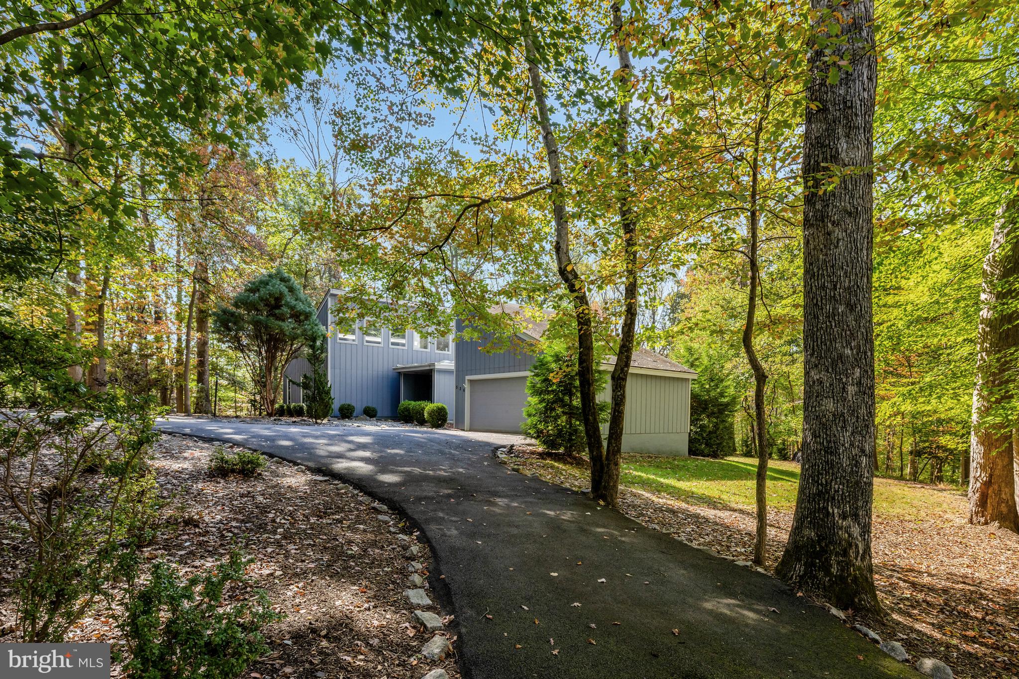 526 Springvale Road Great Falls, VA 22066 - Photo 55 of 55 a view of a house with a yard