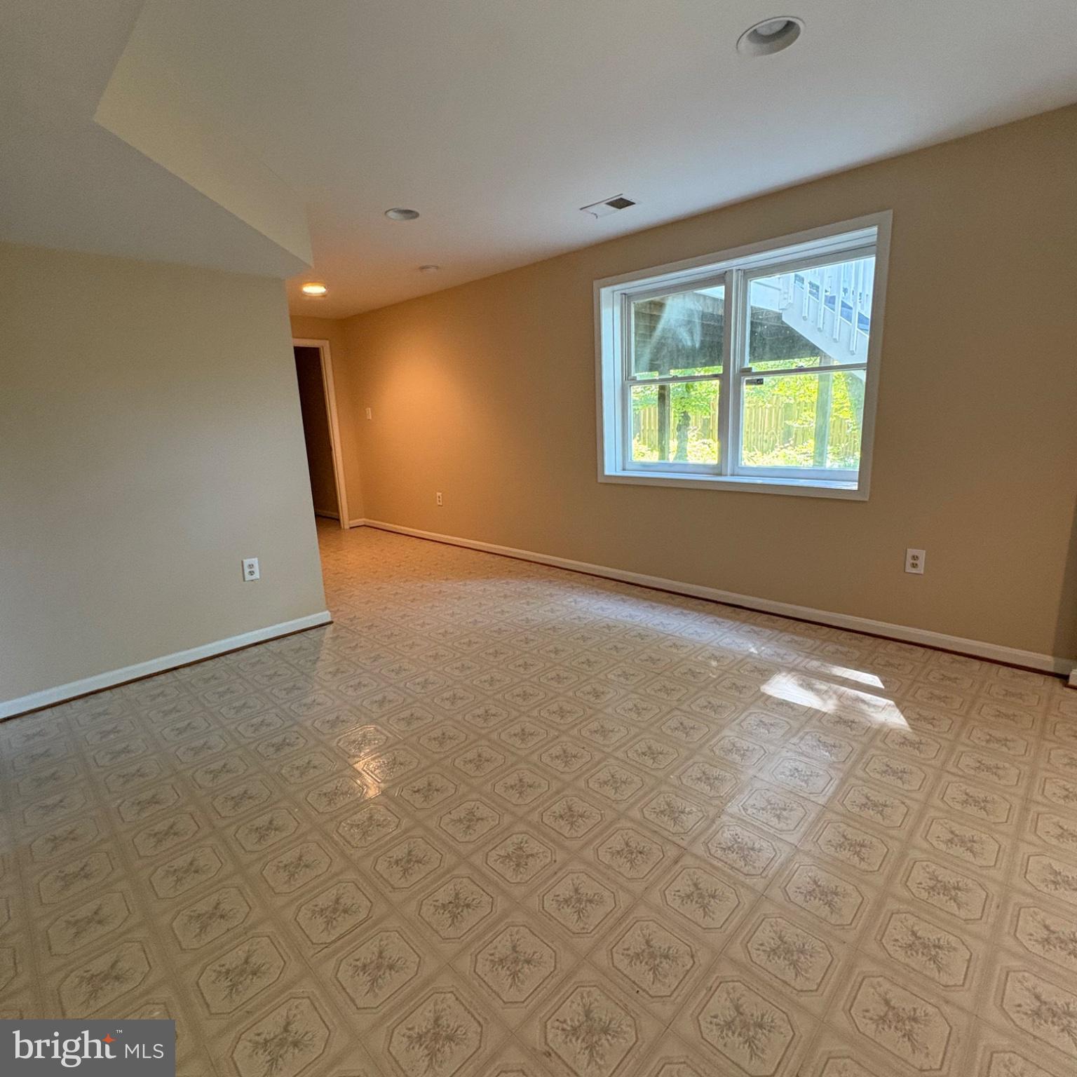 3502 Holly Road Annandale, VA 22003 - Photo 37 of 57 a view of an empty room with a window