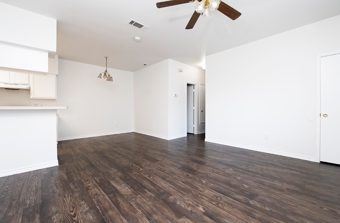 322 Tamara Drive, Unit A Georgetown, TX 78628 - Photo 8 of 17 a view of empty room with wooden floor