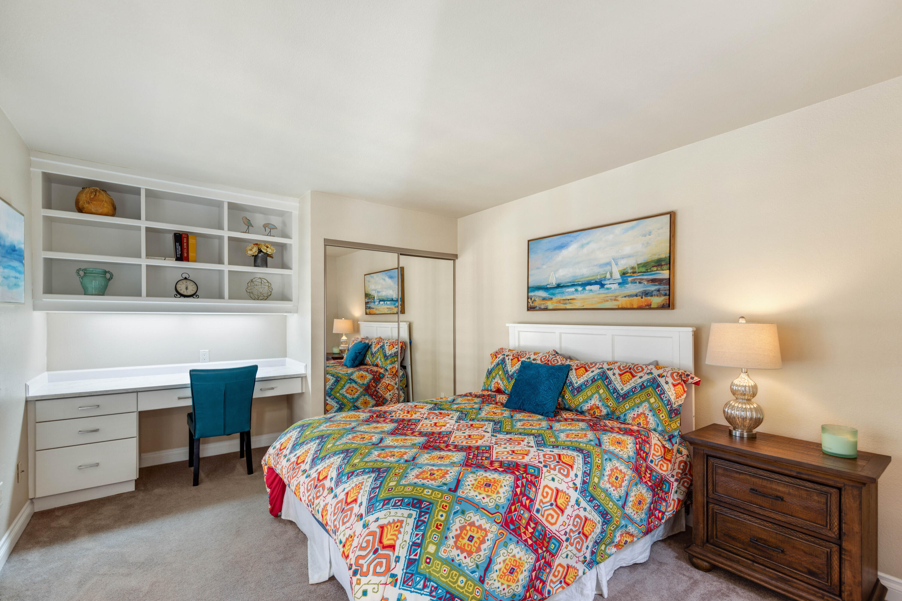 10 La Cerra Circle Rancho Mirage, CA 92270 - Photo 17 of 30 a bedroom with a bed and a cabinets