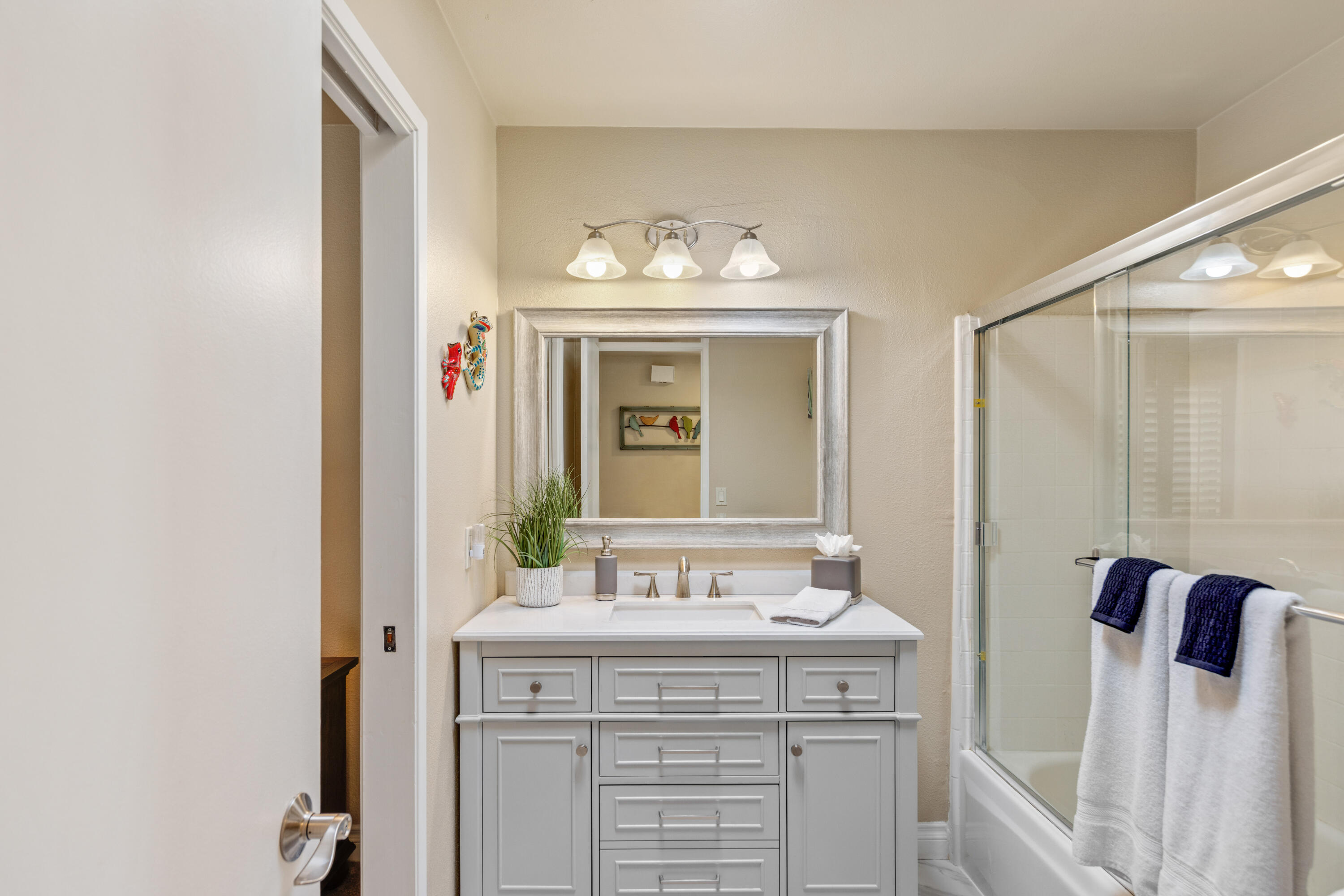 10 La Cerra Circle Rancho Mirage, CA 92270 - Photo 19 of 30 a bathroom with a sink and a mirror