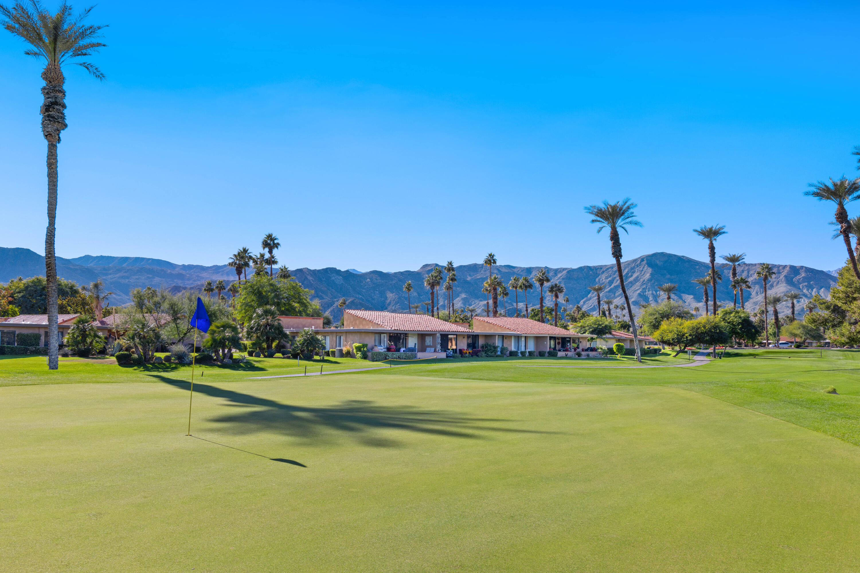 10 La Cerra Circle Rancho Mirage, CA 92270 - Photo 25 of 30 a view of a golf course with a house
