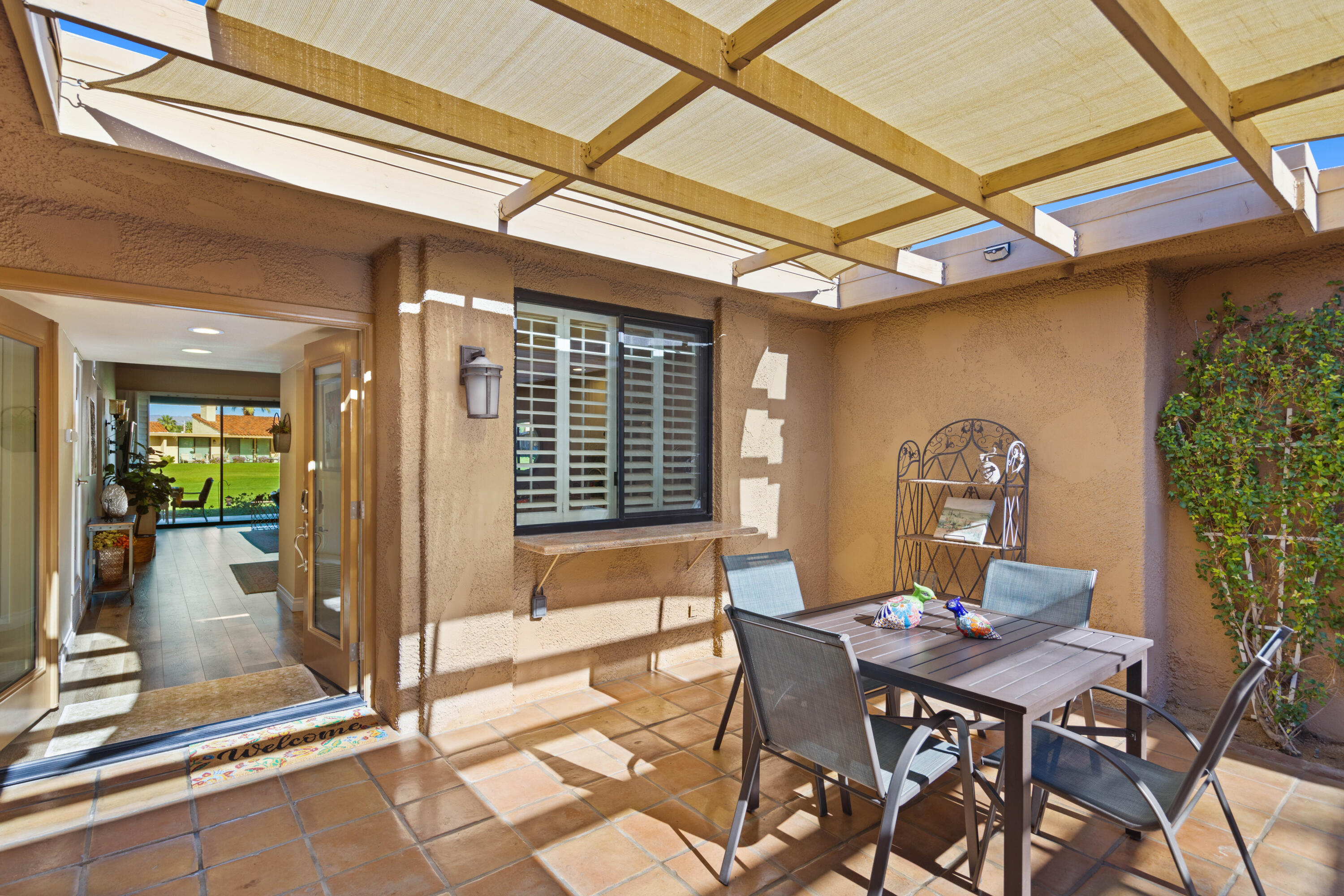 10 La Cerra Circle Rancho Mirage, CA 92270 - Photo 3 of 30 a view of a dining room with furniture