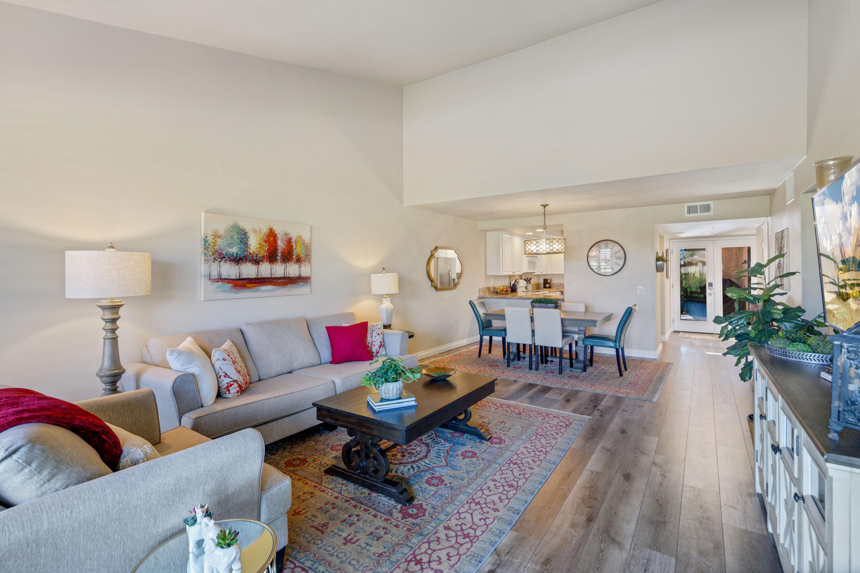 10 La Cerra Circle Rancho Mirage, CA 92270 - Photo 6 of 30 a living room with furniture and wooden floor