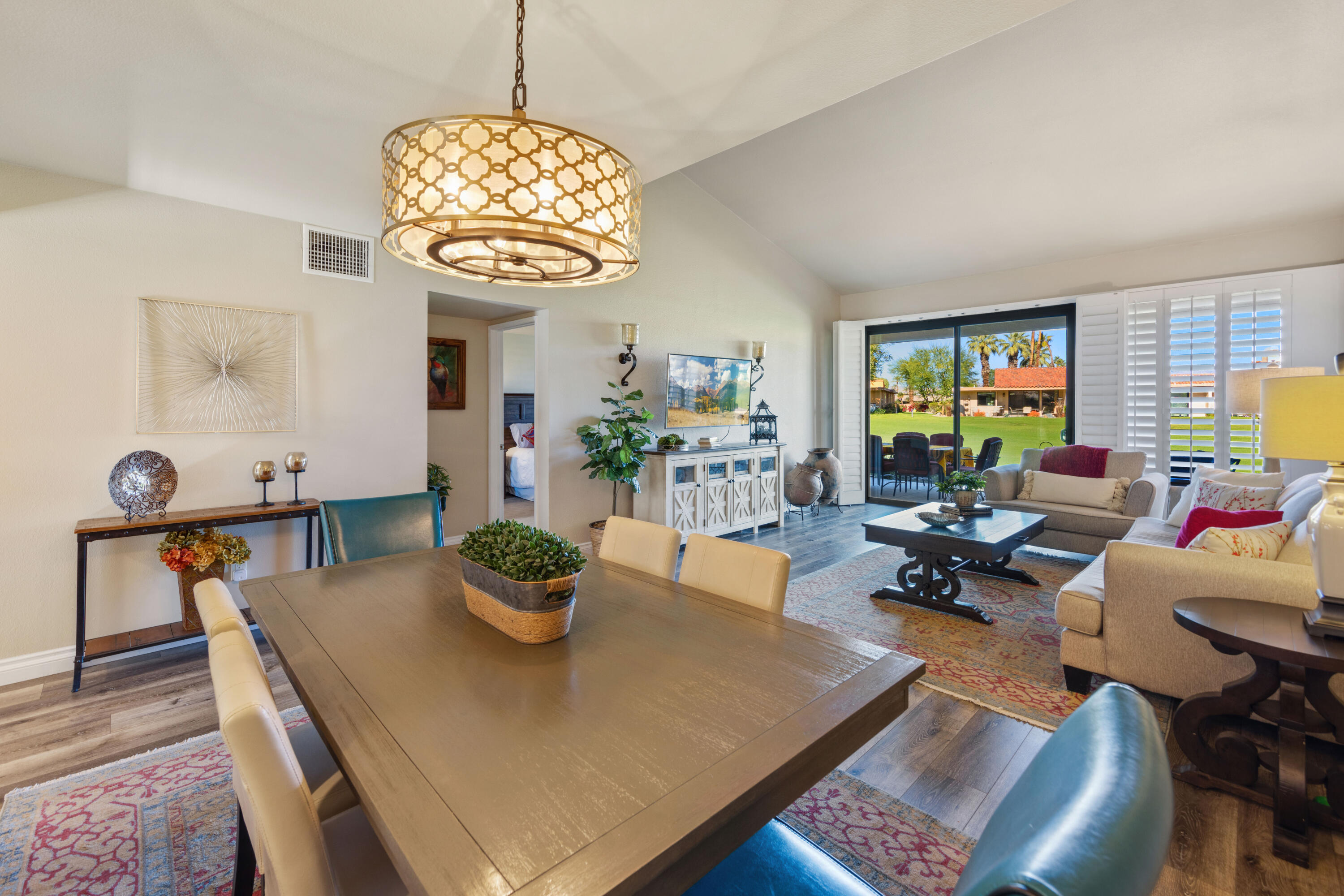 10 La Cerra Circle Rancho Mirage, CA 92270 - Photo 8 of 30 a view of a dining room with furniture window and outside view