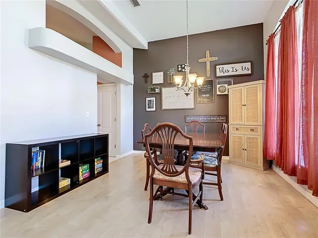 a kitchen with cabinets and appliances