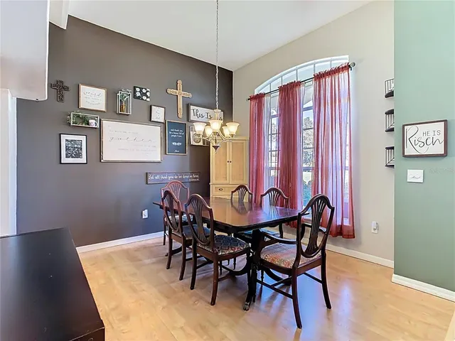 a kitchen with a cabinets and white appliances