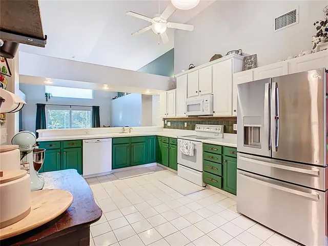 a living room with furniture rug and window