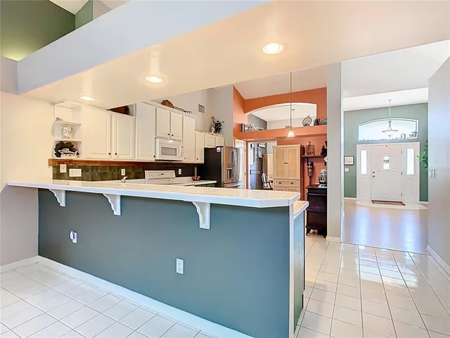 a spacious bathroom with a double vanity sink double vanity and a mirror