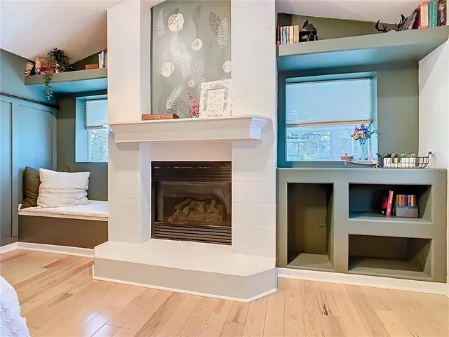 a swimming pool with outdoor seating