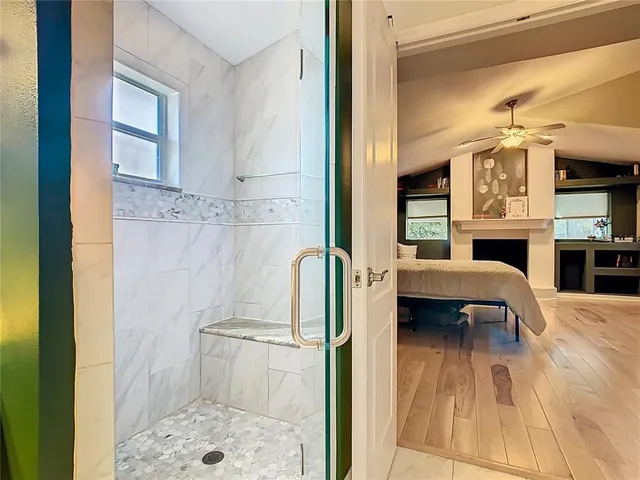 a view of a swimming pool with a patio