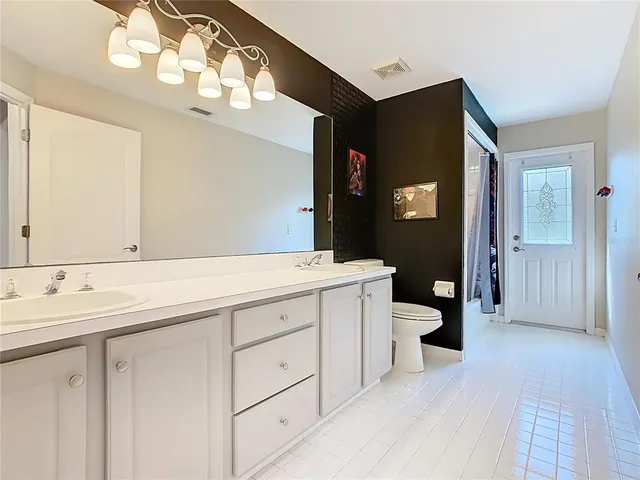 a aerial view of a house with a yard