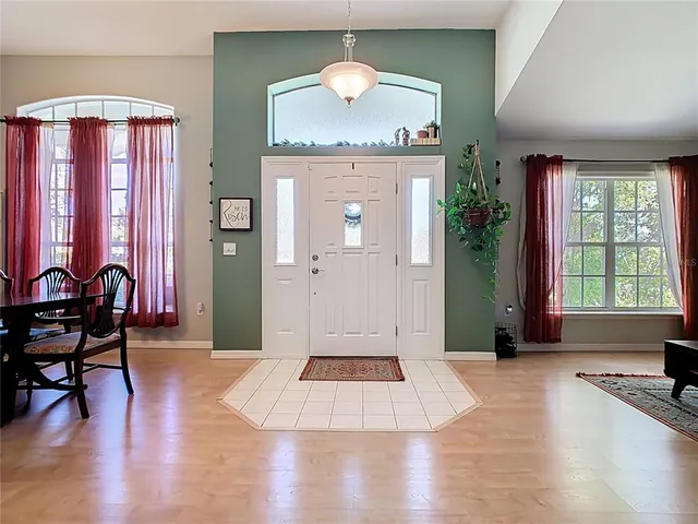 a view of a livingroom with furniture and window