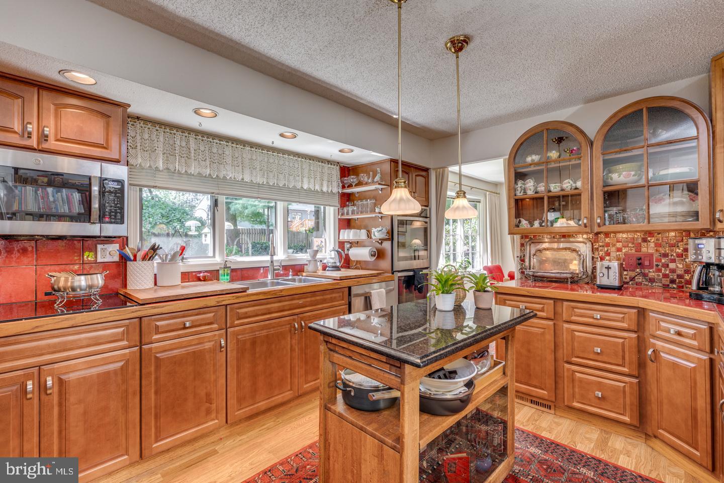 209 Harvest Road Cherry Hill, NJ 08002 - Photo 16 of 46 a kitchen with stainless steel appliances a sink a counter space cabinets and furniture