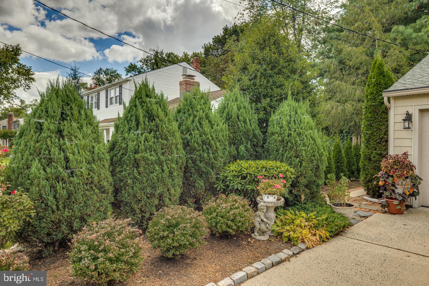 209 Harvest Road Cherry Hill, NJ 08002 - Photo 2 of 46 a view of a garden with a patio