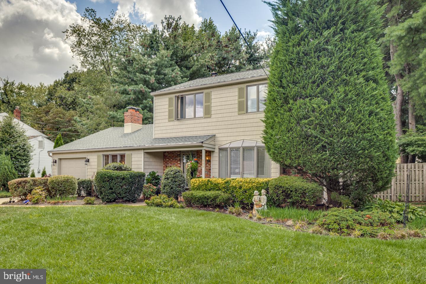209 Harvest Road Cherry Hill, NJ 08002 - Photo 3 of 46 a house that is sitting in the grass