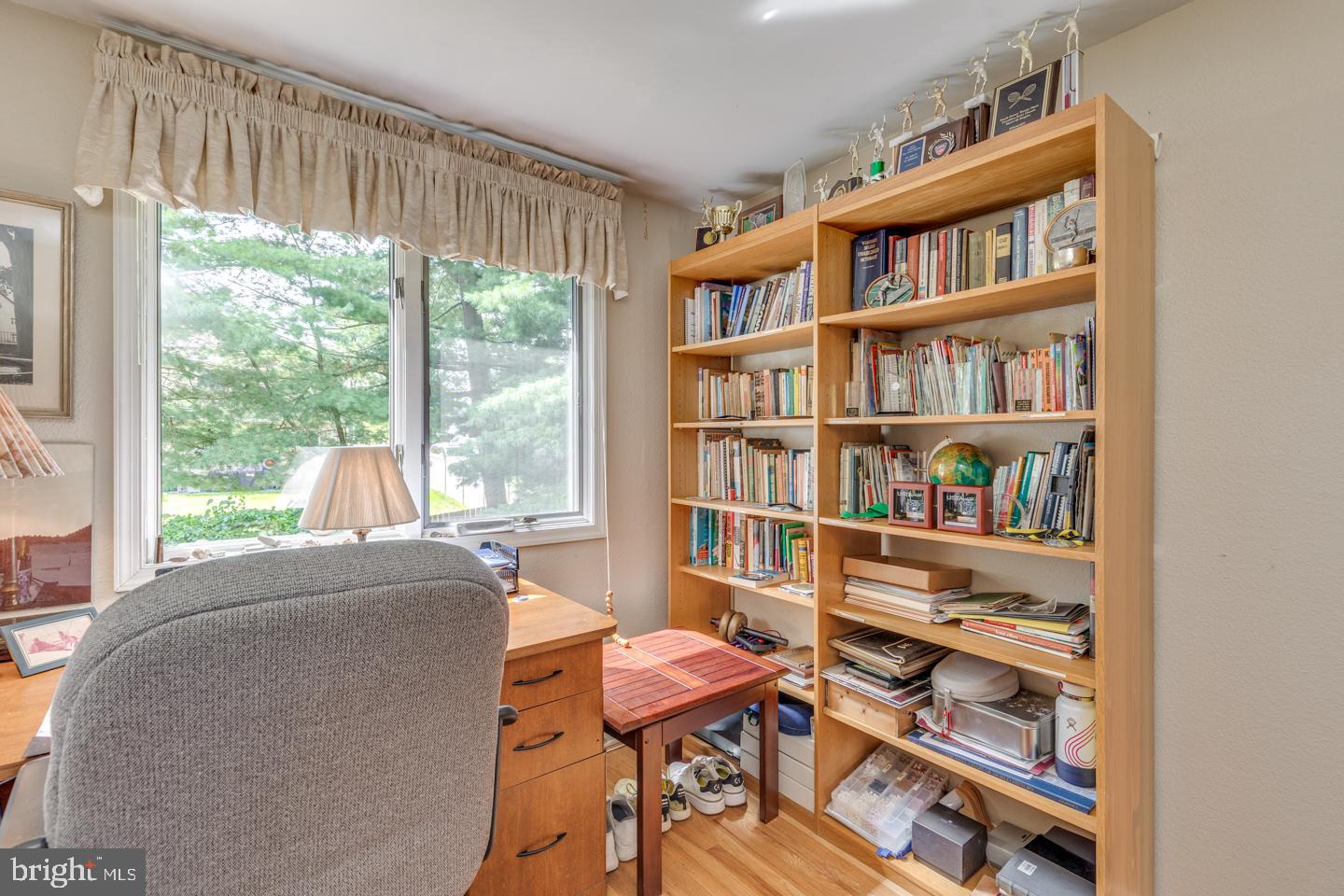 209 Harvest Road Cherry Hill, NJ 08002 - Photo 33 of 46 a living room with furniture and a book shelf
