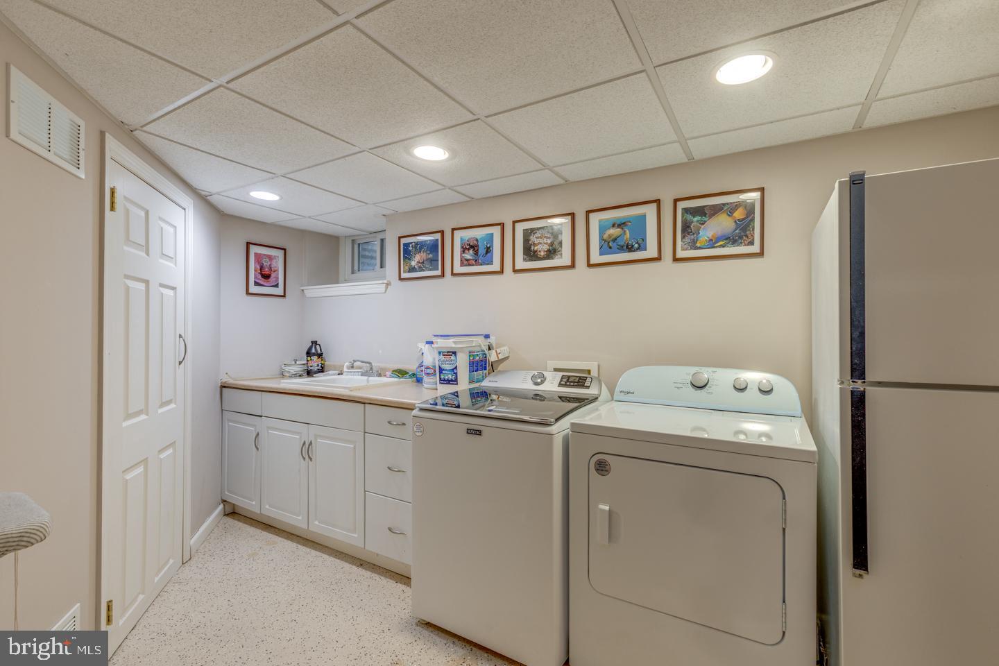 209 Harvest Road Cherry Hill, NJ 08002 - Photo 39 of 46 a utility room with dryer and washer