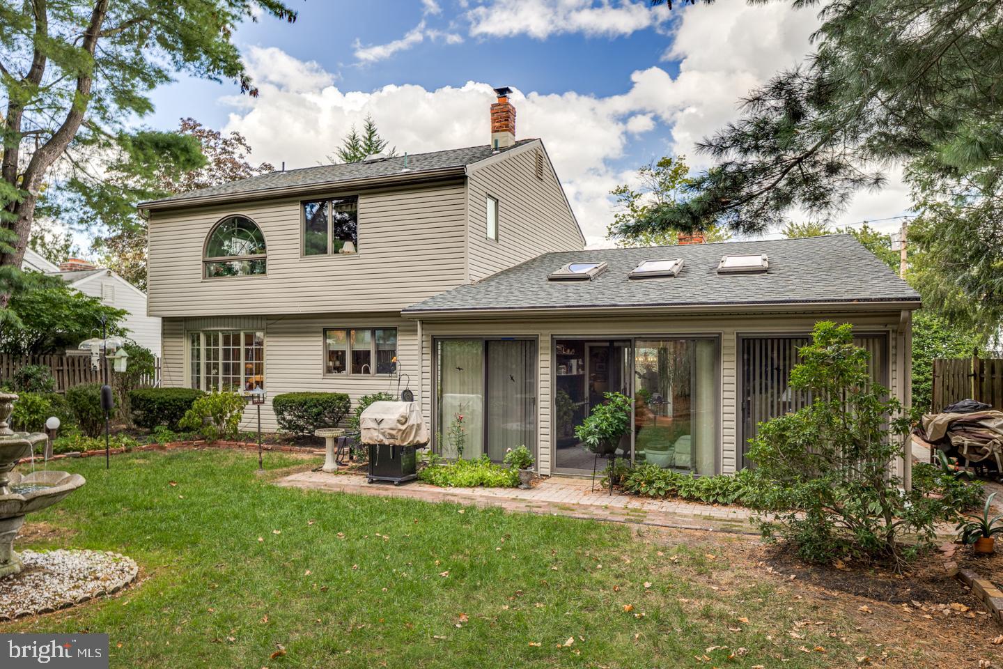 209 Harvest Road Cherry Hill, NJ 08002 - Photo 42 of 46 a view of a white house with a yard and potted plants