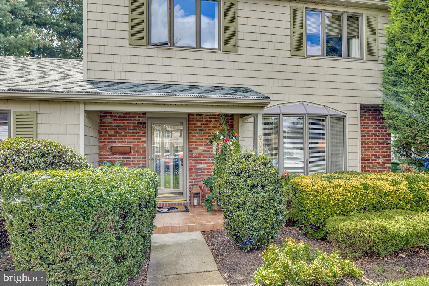 209 Harvest Road Cherry Hill, NJ 08002 - Photo 5 of 46 front view of a house with a yard