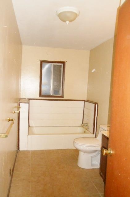 41249 Brown Road Fall River Mills, CA 96028 - Photo 15 of 19 a bathroom with a toilet and a mirror