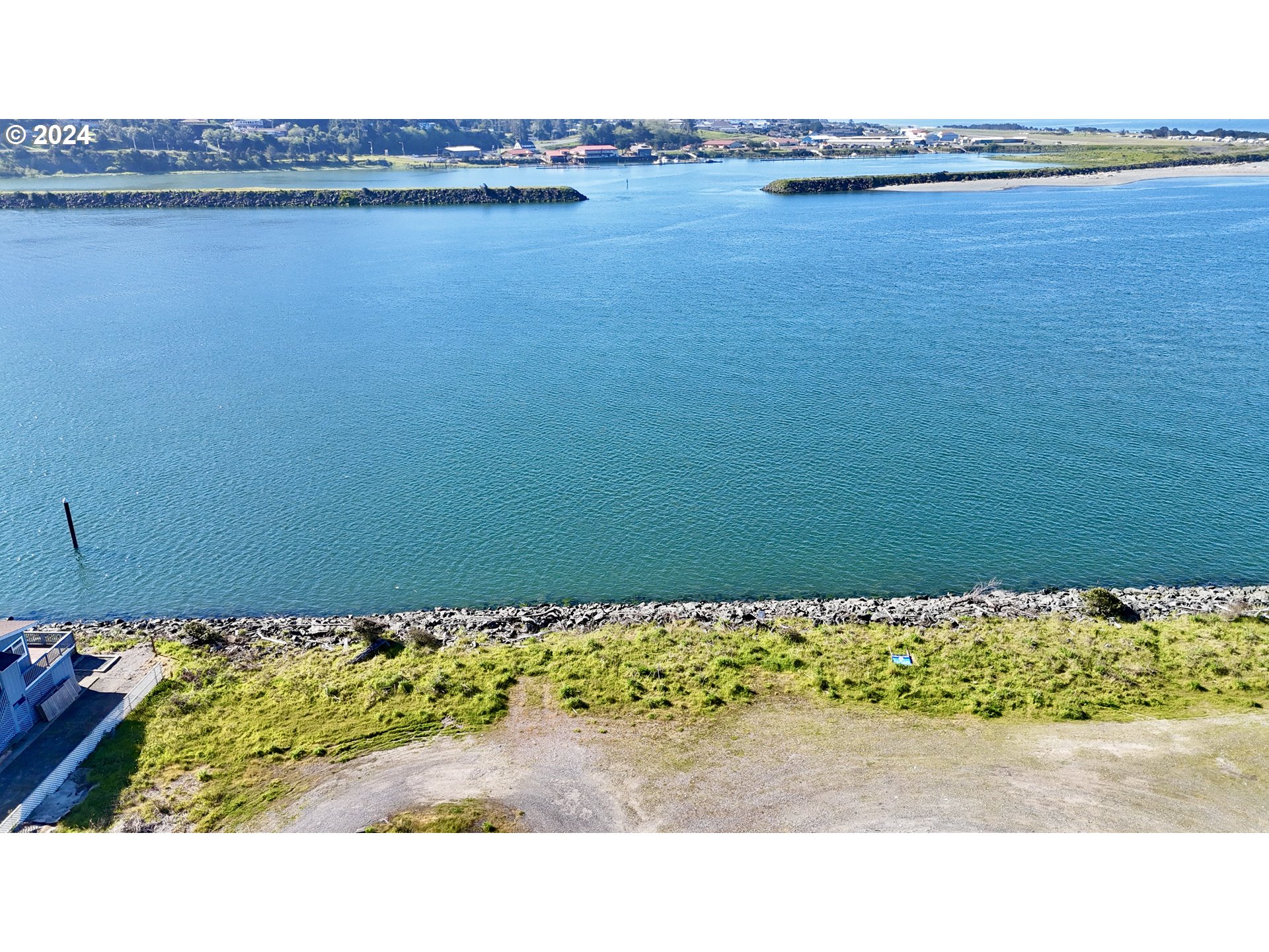 Wedderburn Loop Gold Beach, OR 97444 - Photo 12 of 24 a view of an ocean and mountain