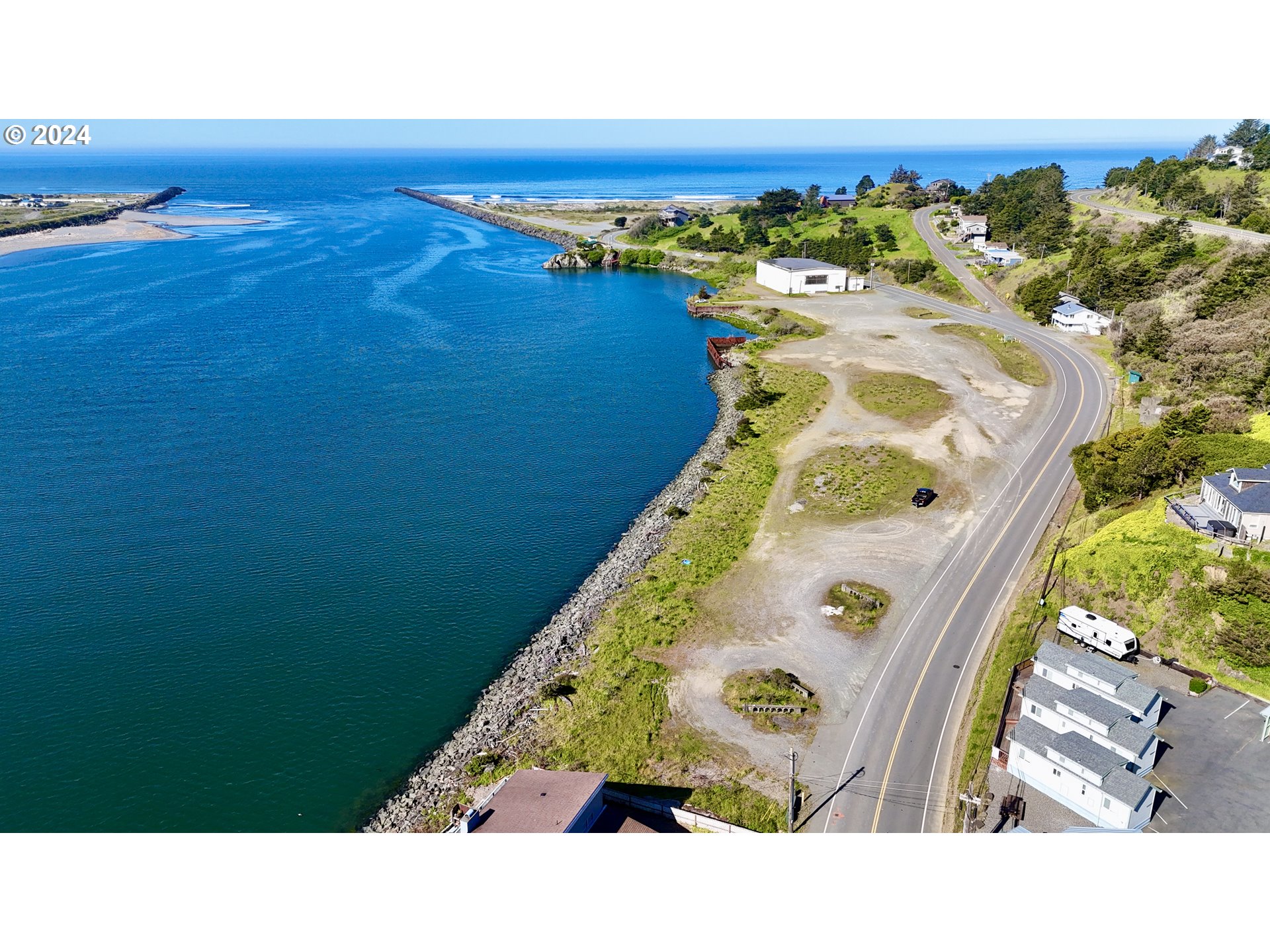 Wedderburn Loop Gold Beach, OR 97444 - Photo 14 of 24 a black and white photo of a lake