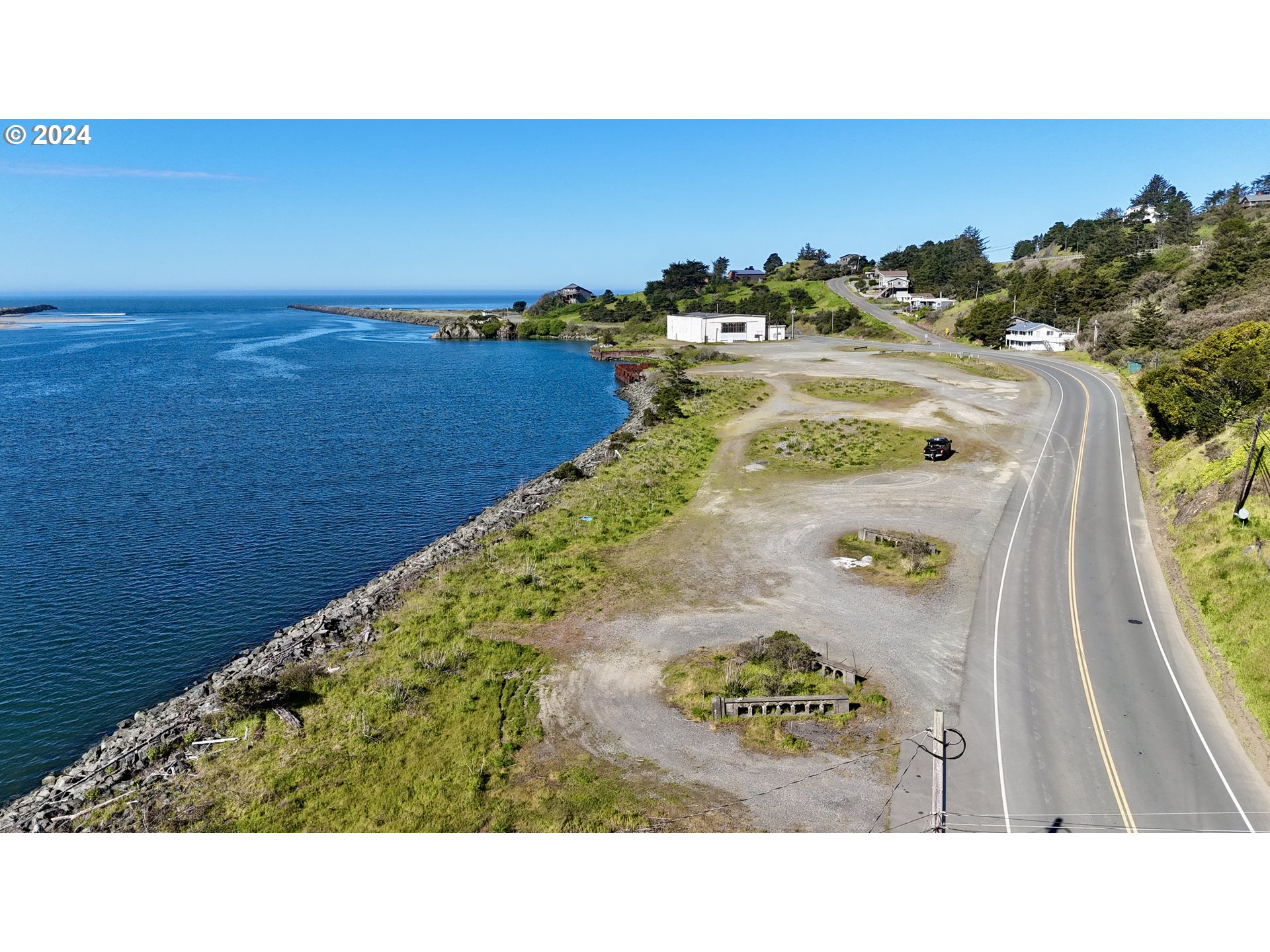 Wedderburn Loop Gold Beach, OR 97444 - Photo 16 of 24 a black and white photo of a city