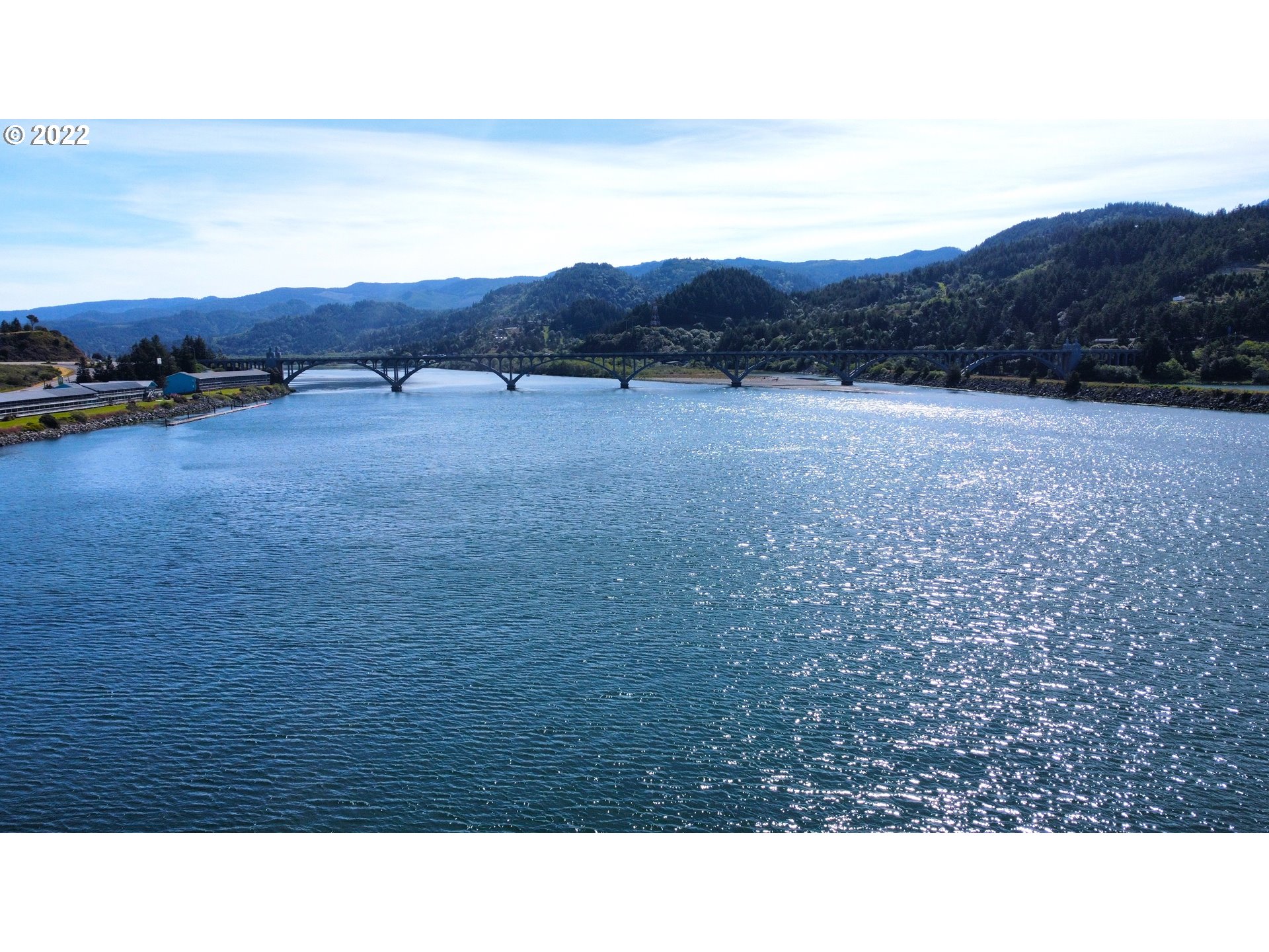 Wedderburn Loop Gold Beach, OR 97444 - Photo 4 of 24 a open area with mountains in the background