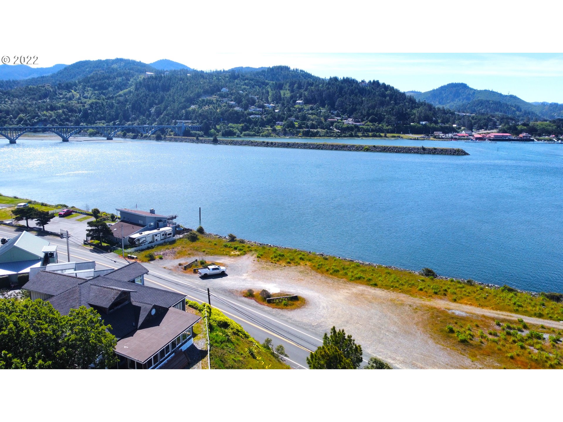 Wedderburn Loop Gold Beach, OR 97444 - Photo 8 of 24 a picture of city view with lake view