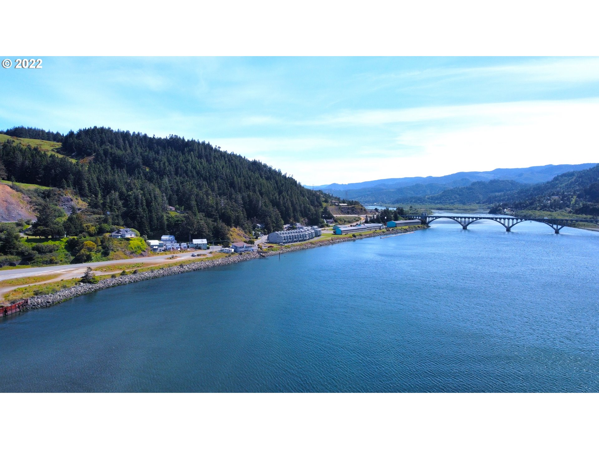 Wedderburn Loop Gold Beach, OR 97444 - Photo 10 of 24 a open area with mountains in the background