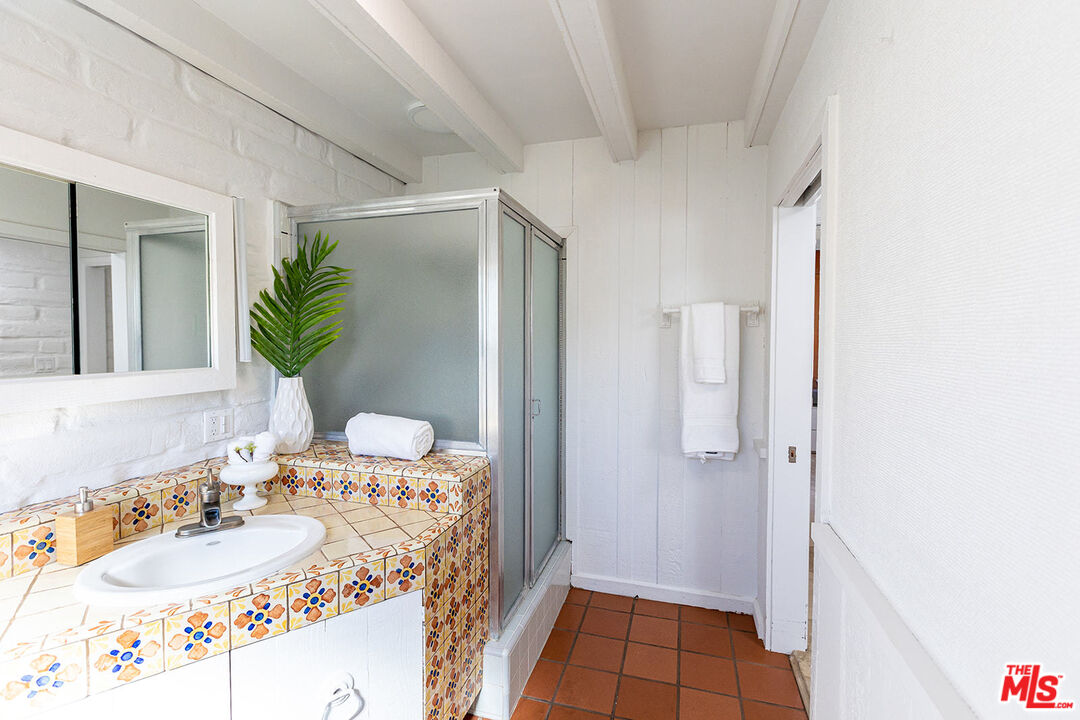 876 Center Street El Segundo, CA 90245 - Photo 15 of 32 a bathroom with a sink and a mirror