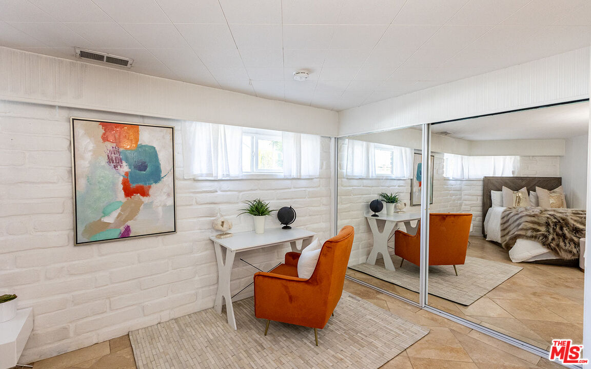 876 Center Street El Segundo, CA 90245 - Photo 21 of 32 a living room with furniture and a window