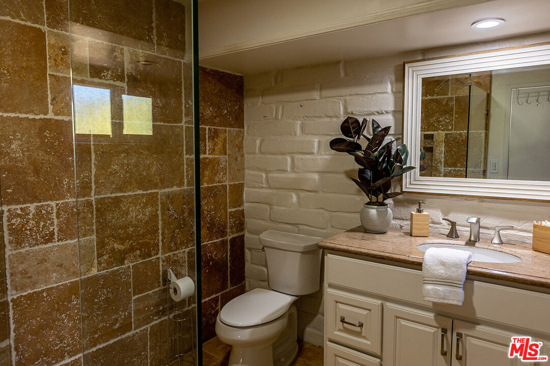 876 Center Street El Segundo, CA 90245 - Photo 22 of 32 a bathroom with a sink toilet and shower