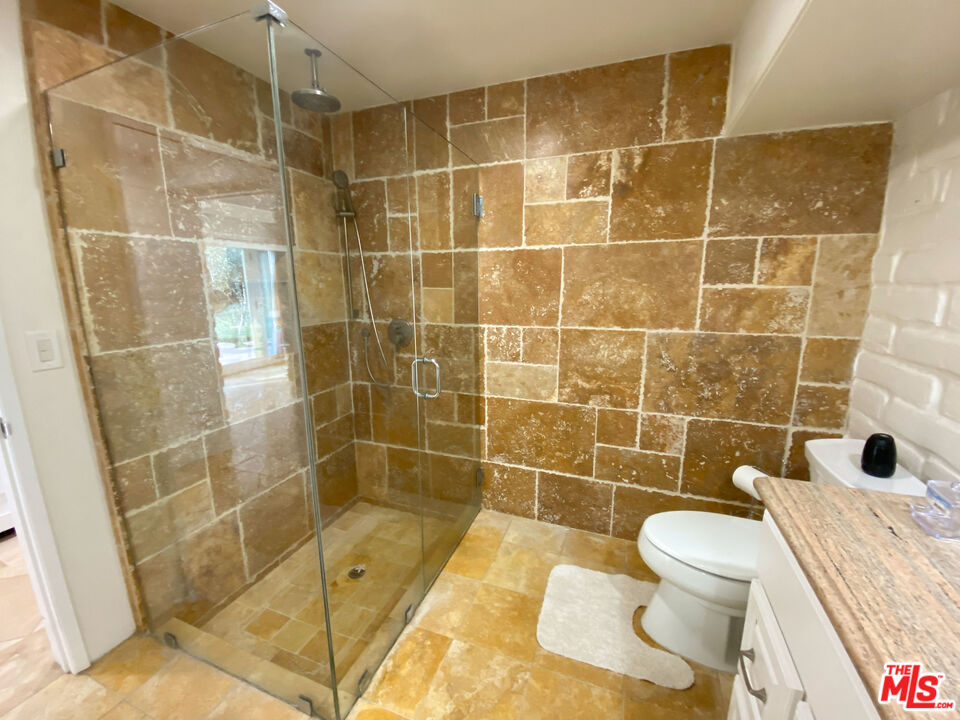 876 Center Street El Segundo, CA 90245 - Photo 23 of 32 a bathroom with a sink toilet and shower