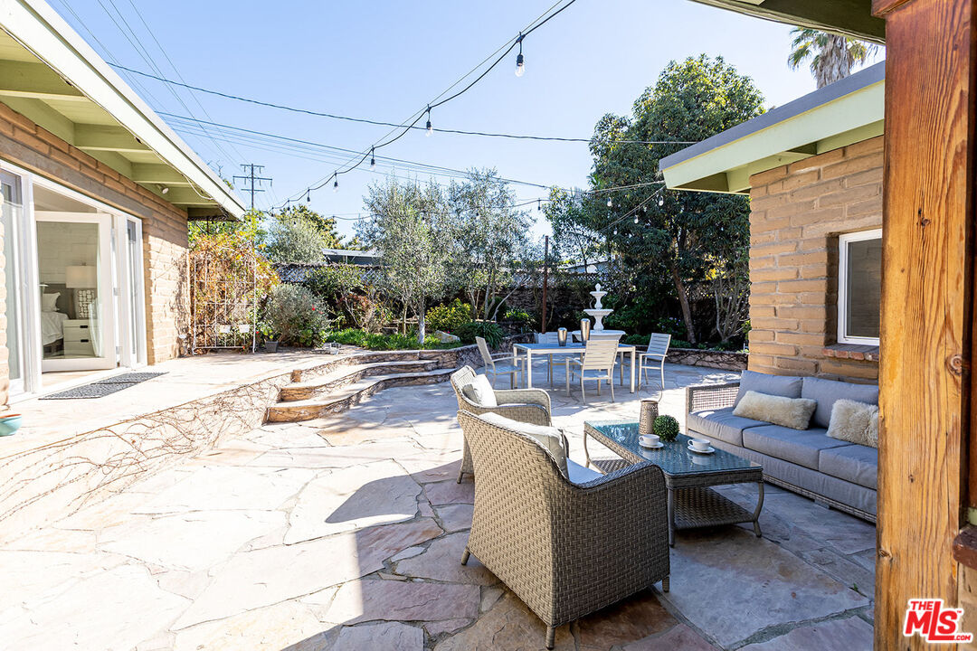 876 Center Street El Segundo, CA 90245 - Photo 29 of 32 a view of a patio with couches and potted plants