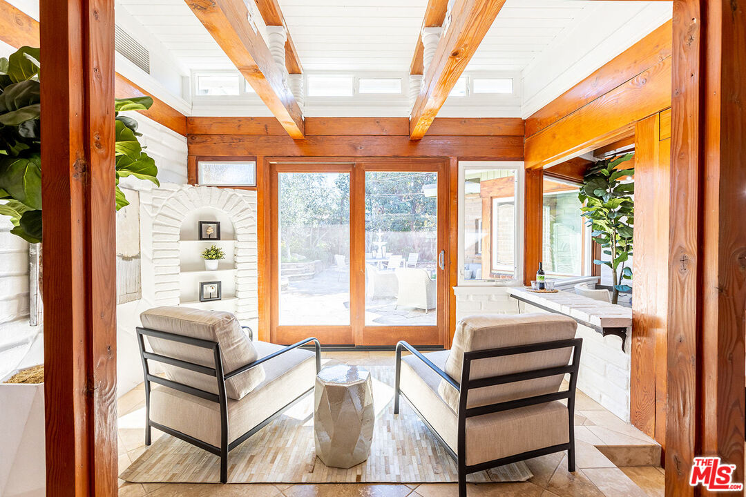 876 Center Street El Segundo, CA 90245 - Photo 9 of 32 a bedroom with furniture and a large window