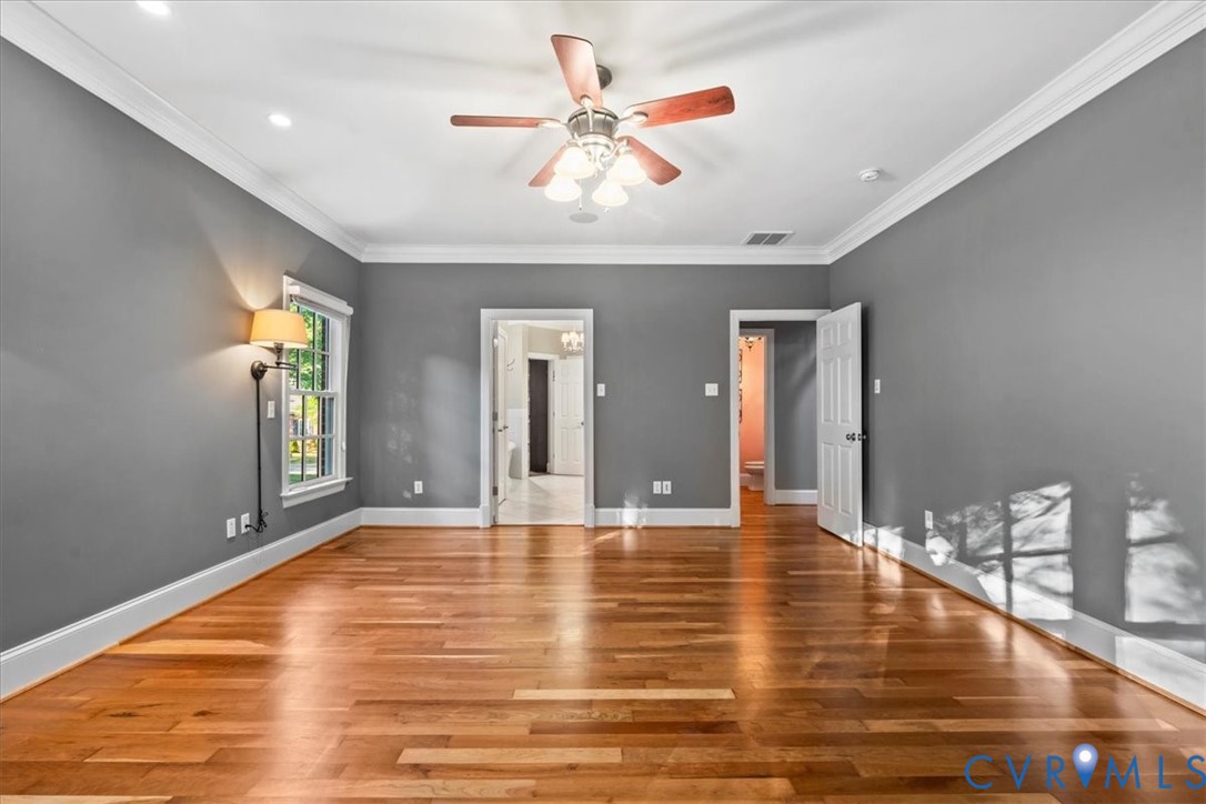 3308 Yarding Way Toano, VA 23168 - Photo 45 of 83 a view of an empty room with window and wooden floor