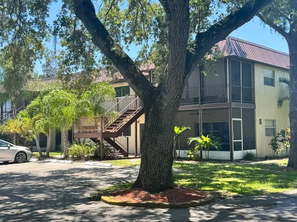 a view of a patio in front of house