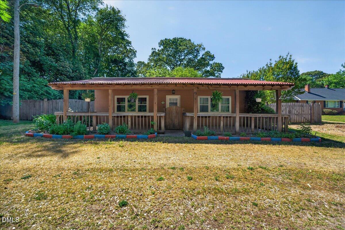 7303 Stony Hill Road Wake Forest, NC 27587 - Photo 1 of 31 front view of a house with a yard