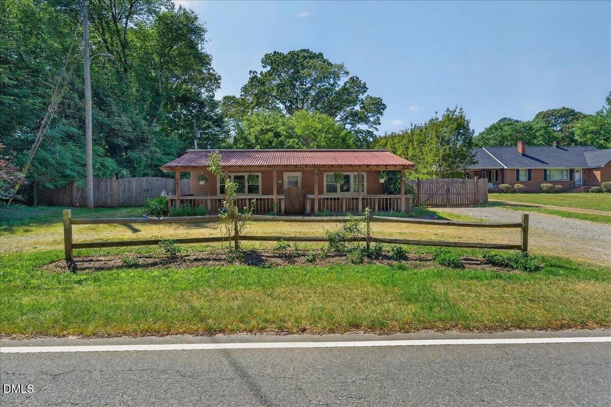 7303 Stony Hill Road Wake Forest, NC 27587 - Photo 3 of 31 a view of a house with a swimming pool
