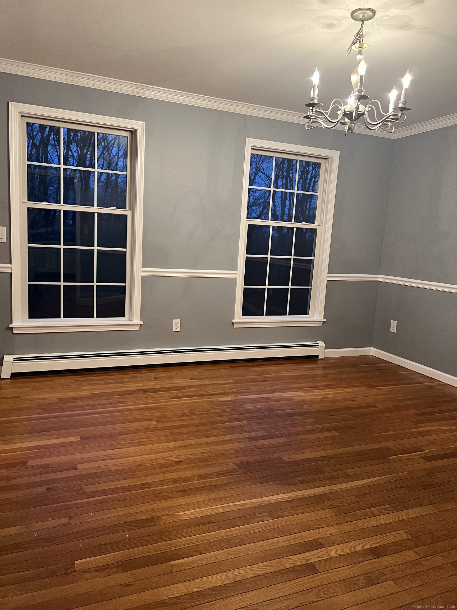 44 North Mountain Road Brookfield, CT 06804 - Photo 6 of 18 a view of empty room with windows and wooden floor