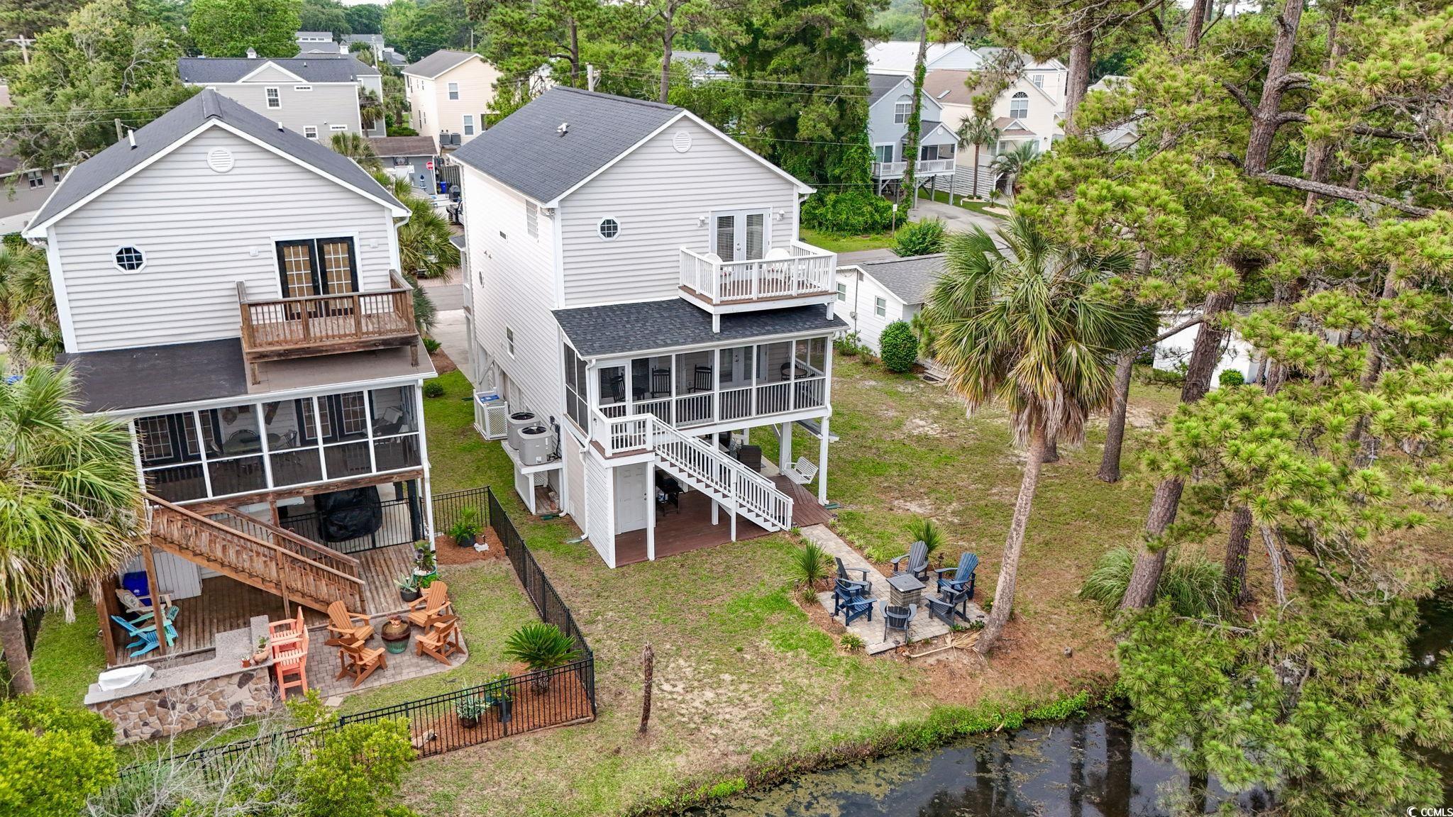 327 A Lakeside Drive Surfside Beach, SC 29575 - Photo 36 of 40 Aerial perspective of suburban area featuring a tree filled landscape