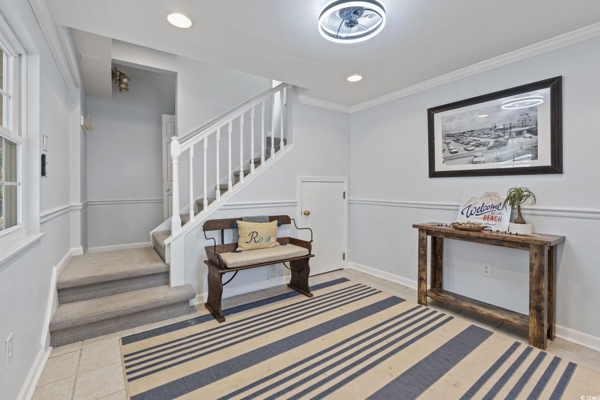 327 A Lakeside Drive Surfside Beach, SC 29575 - Photo 7 of 40 Stairs featuring baseboards, recessed lighting, ornamental molding, and tile patterned floors