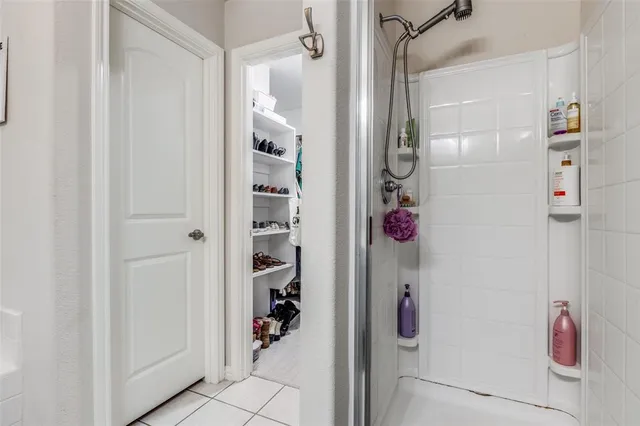 a room with gym equipment and a large window